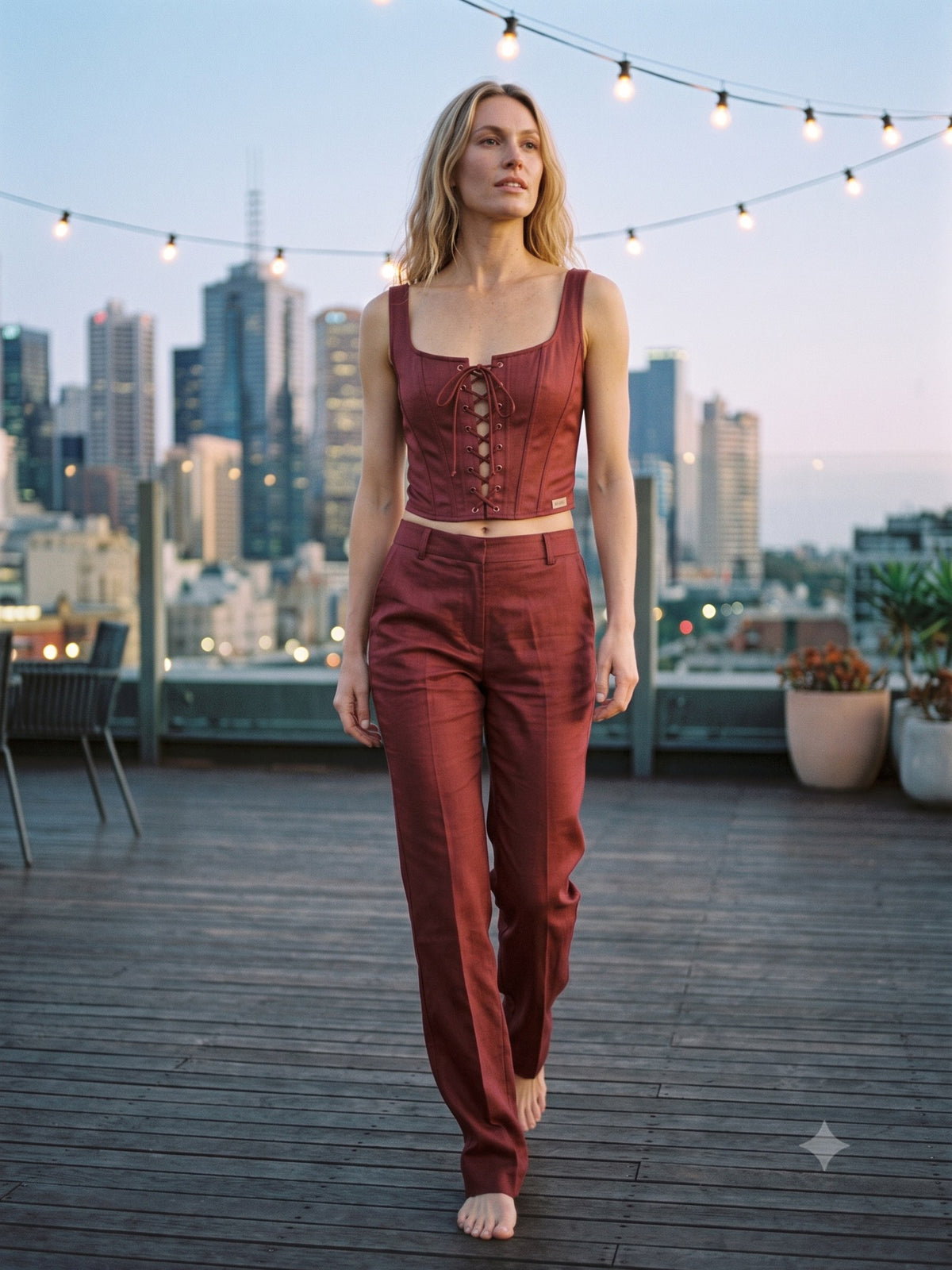 Ash Satin Corset Top in Garnet, in motion