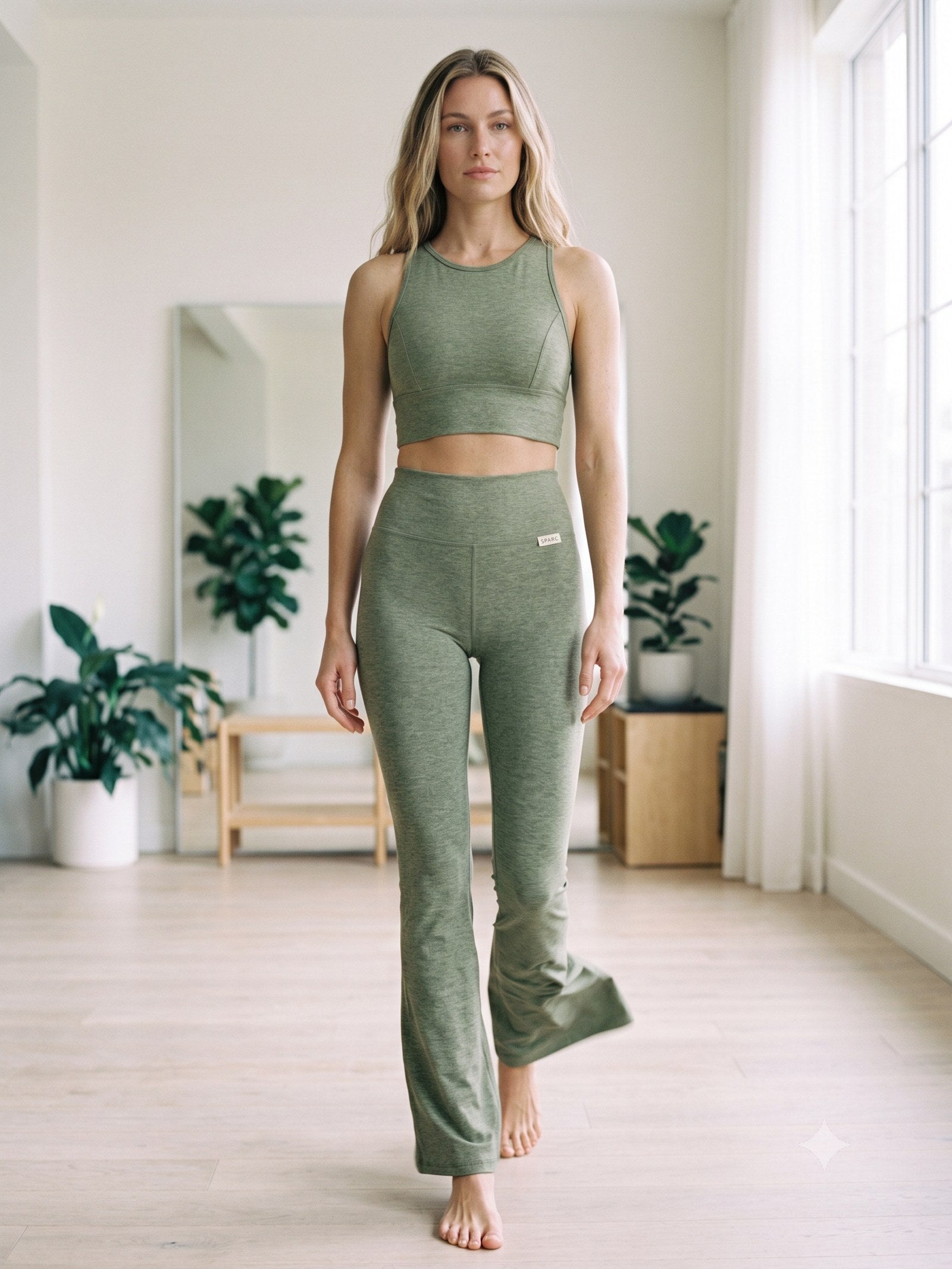 Pulse Sculpt Flared Legging in Sage Marl, in motion