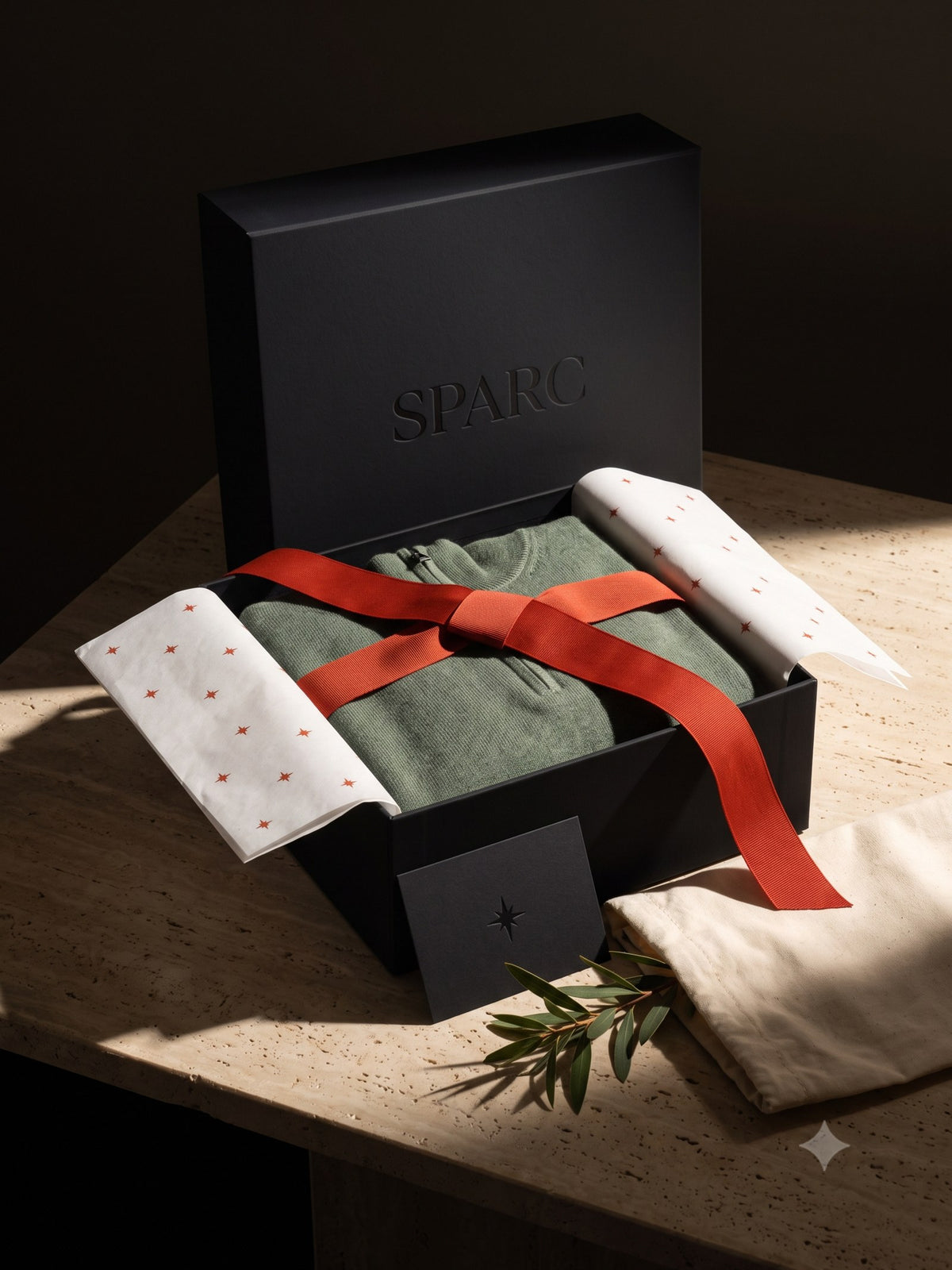 Still Merino Half-Zip Knit, the box