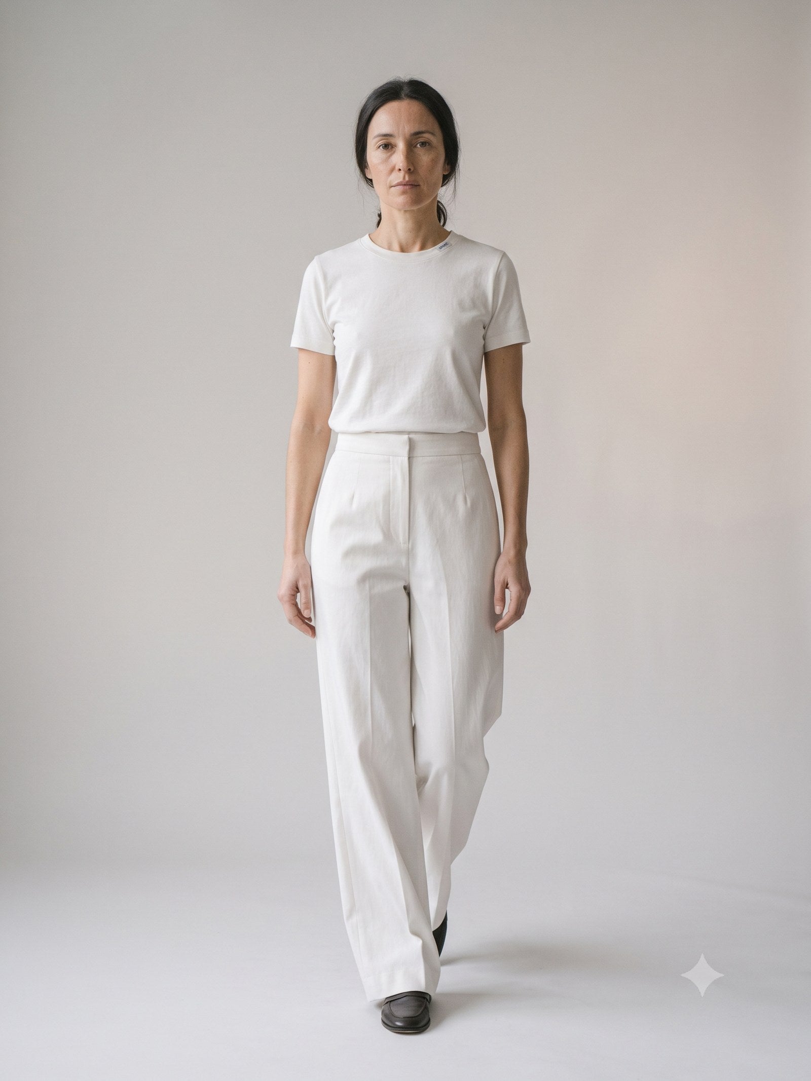 Trestle Fluid Twill Trouser in Chalk, in motion