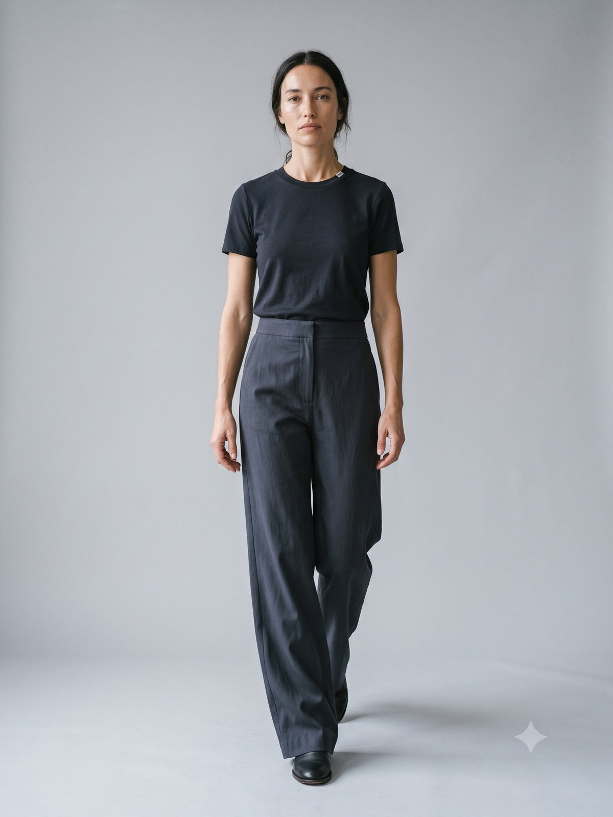 Trestle Fluid Twill Trouser in Ink, in motion