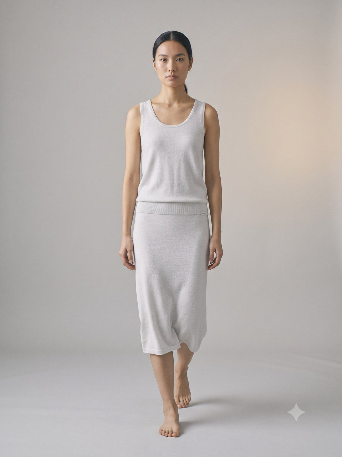 Truss Merino Tank and Skirt Set in Cloud, in motion