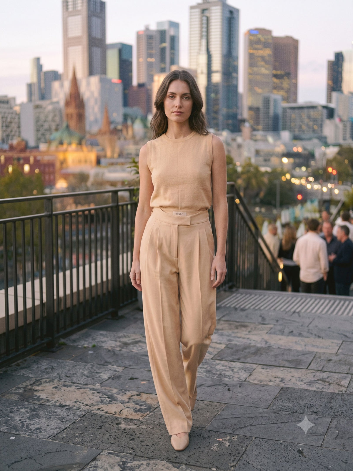 Vigil Pleated Trouser in Champagne, in motion