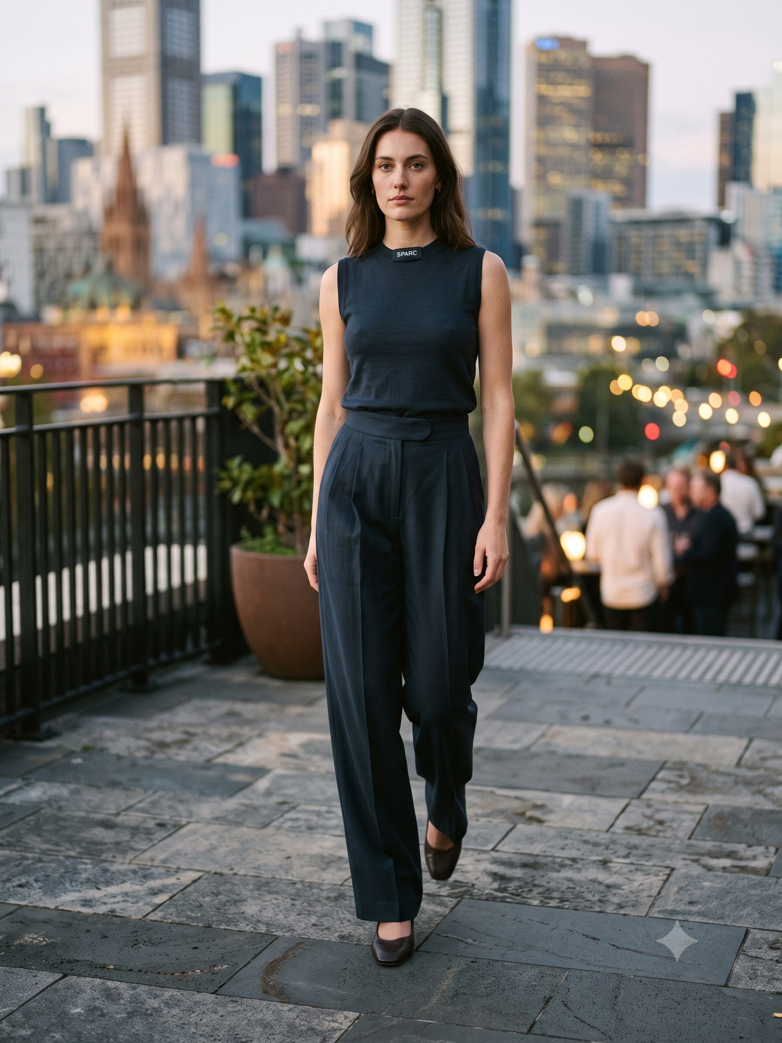 Vigil Pleated Trouser in Ink, in motion