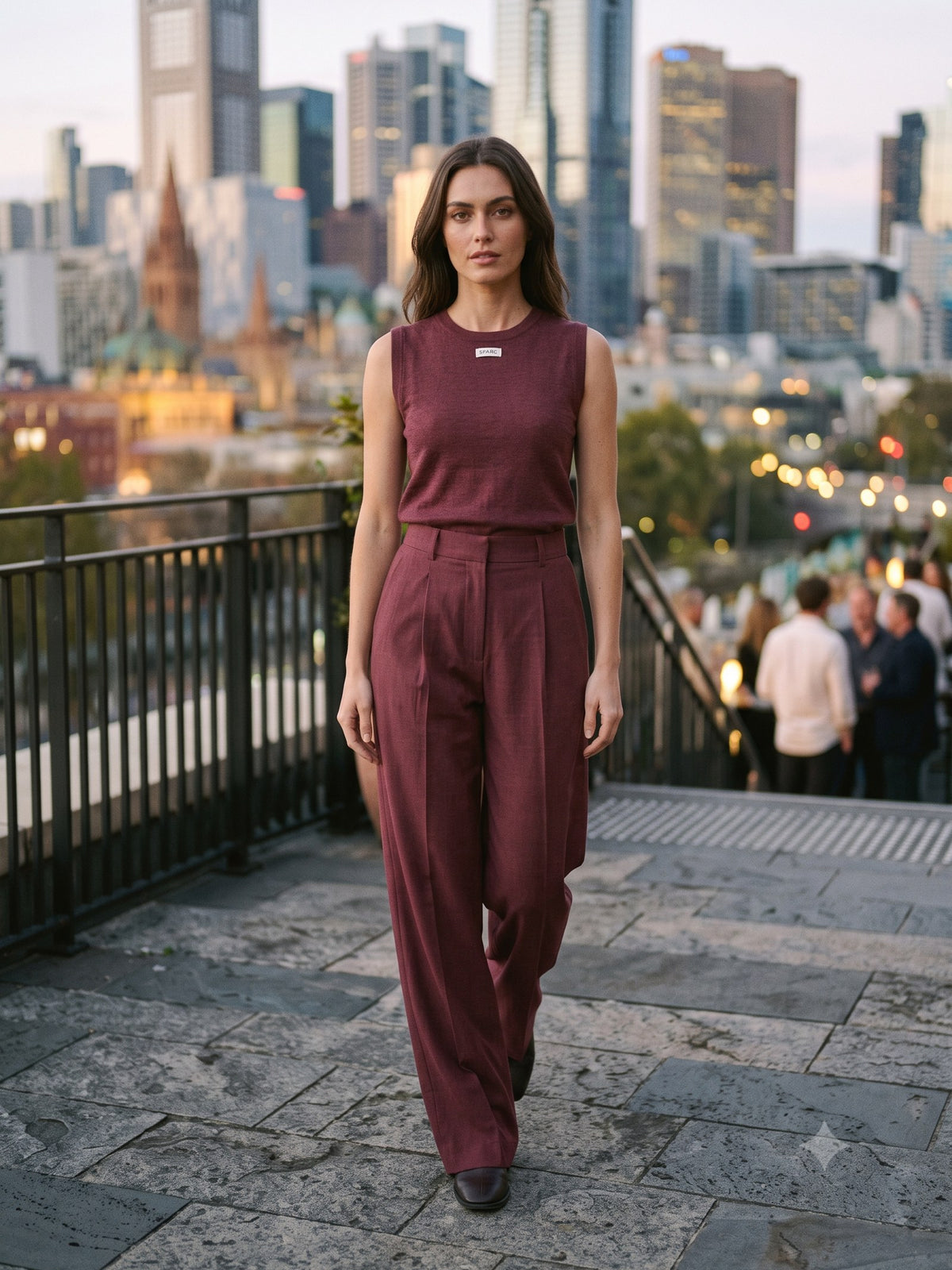 Vigil Pleated Trouser in Mulberry, in motion