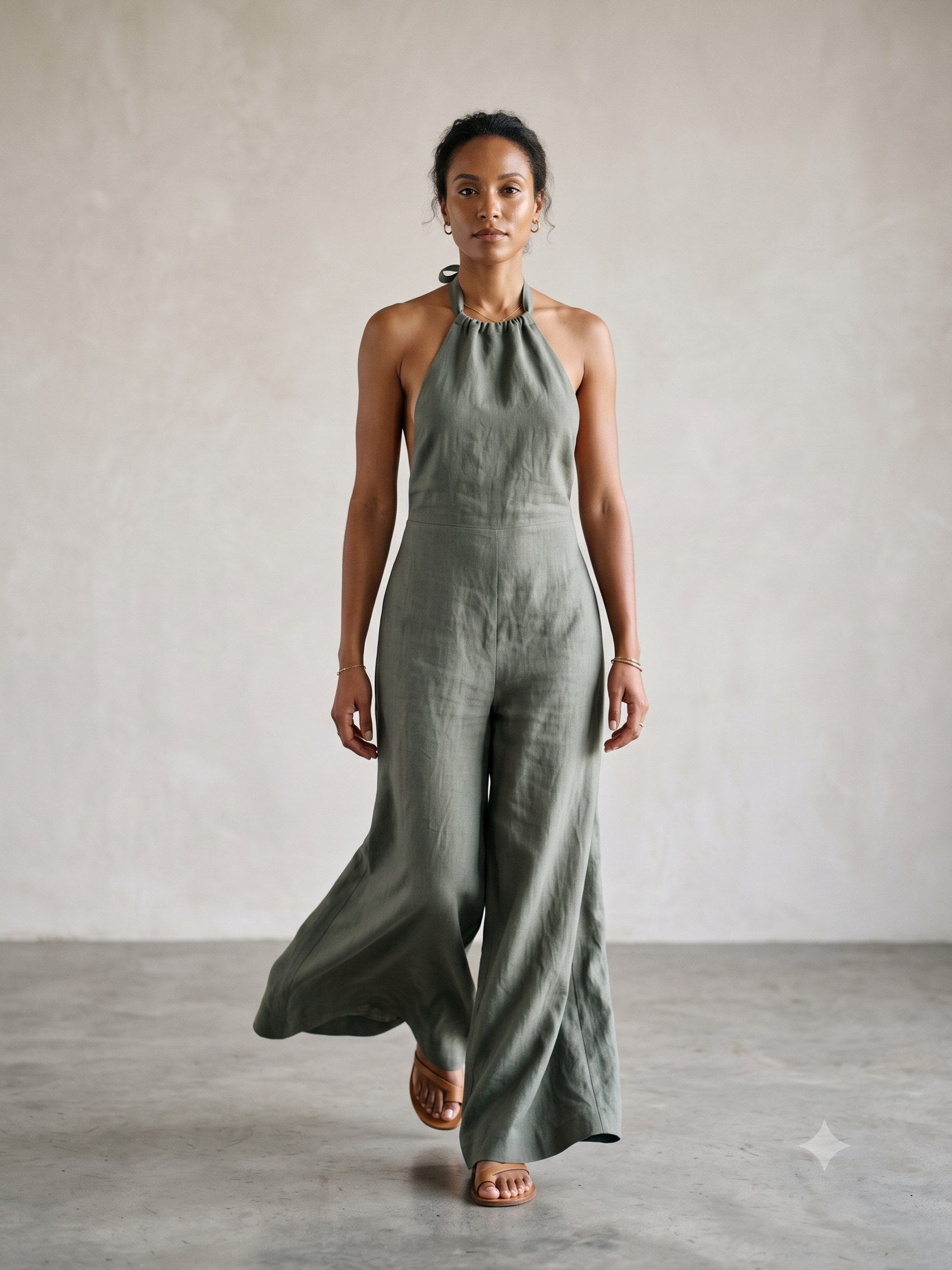 Windward Linen Halter Jumpsuit in Eucalypt, in motion